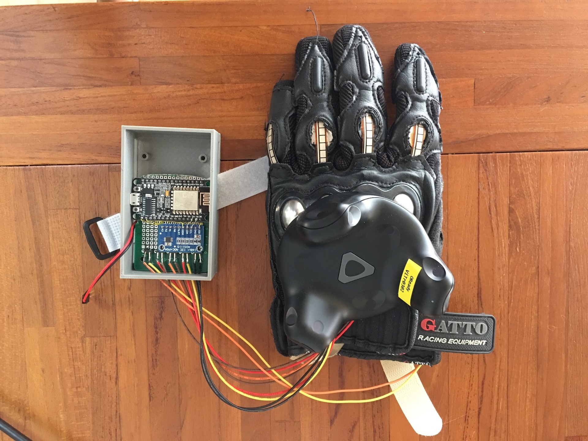 Connected to the hardware EVB (ESP8266+Arduino adopted), integrated with motorcycle gloves available from the market